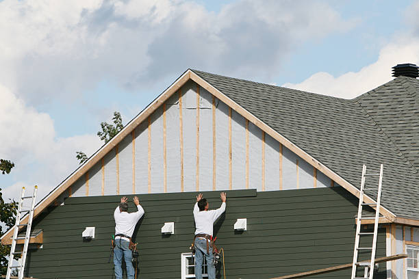 Professional Siding Installation technician working in Weaverville, NC